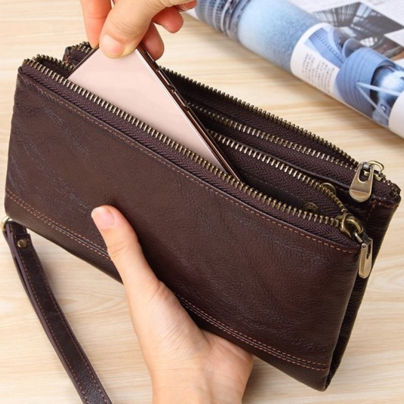 Багатофункціональний чоловічий клатч-гаманець з натуральної шкіри з вбудованою кишенею та відділенням для паспорта