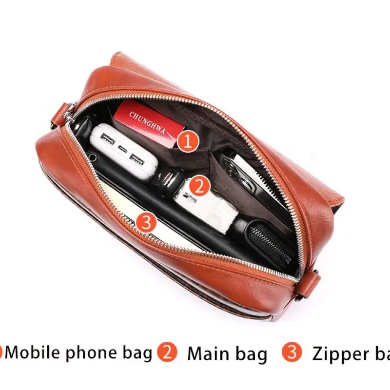 Чоловіча та жіночка сумка з люксової екошкіри